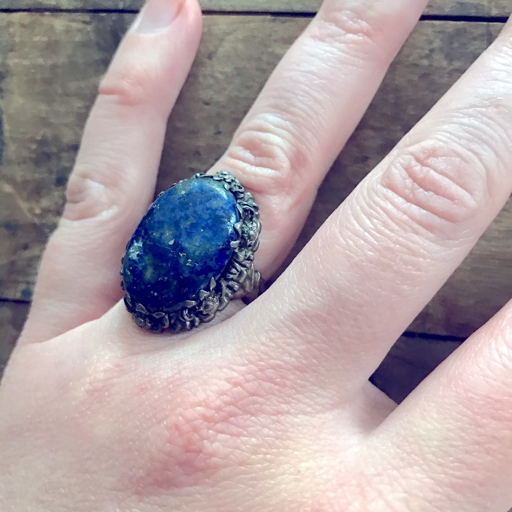 Vintage cocktail ring floral metalwork and blue stone